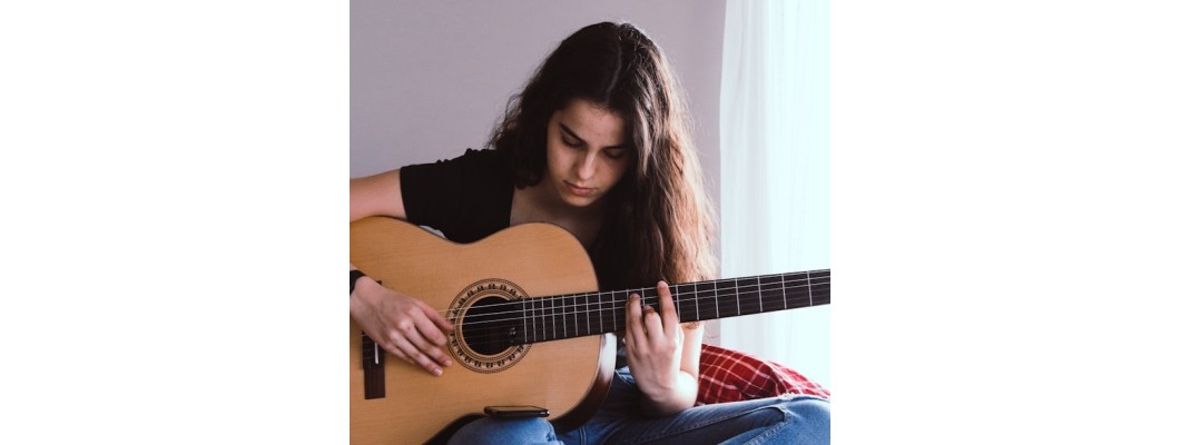 Kodėl verta mokytis groti gitara?